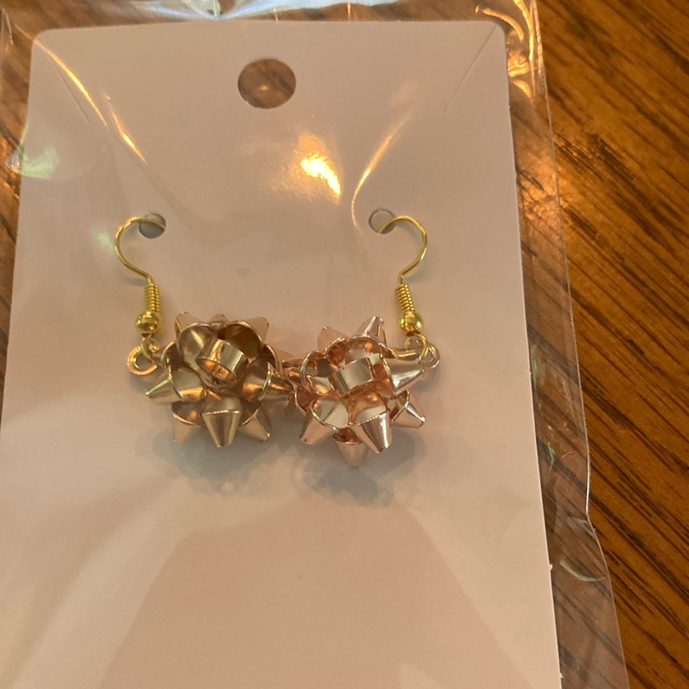 “Gold Christmas Bow” earrings.